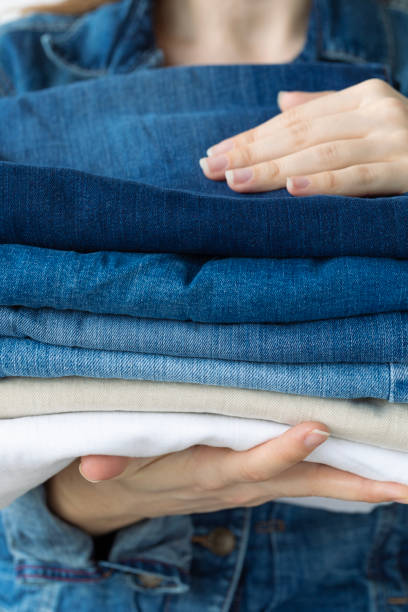 istock Woman Holding Jeans 2170143279