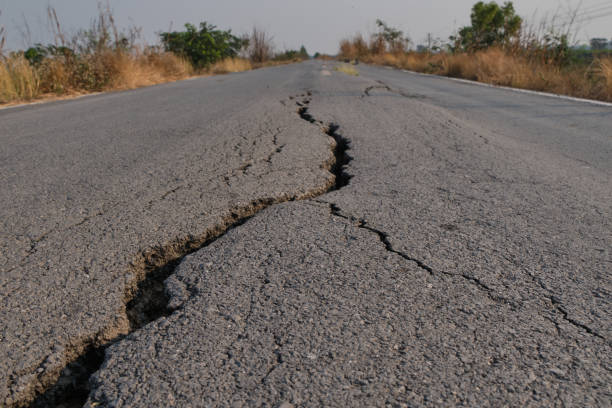 istock Asphalt surface on the street was demolished due to poor construction. 2170145000