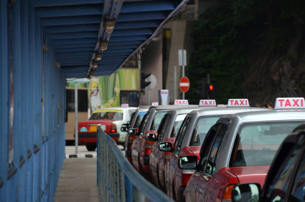 A photo of a taxi stand where taxis are waiting for passengers.