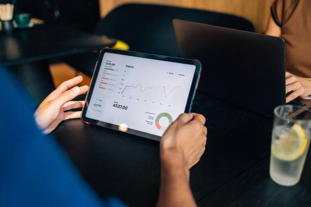 istock Business Team Analyzing Data on Digital Tablet in Office Meeting 2170146465