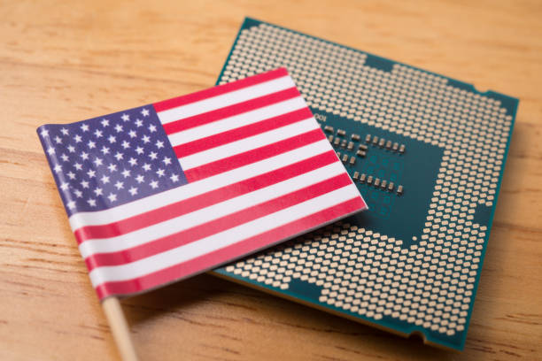 istock America flag on CPU computer (central processing unit) wooden background. 2170149180