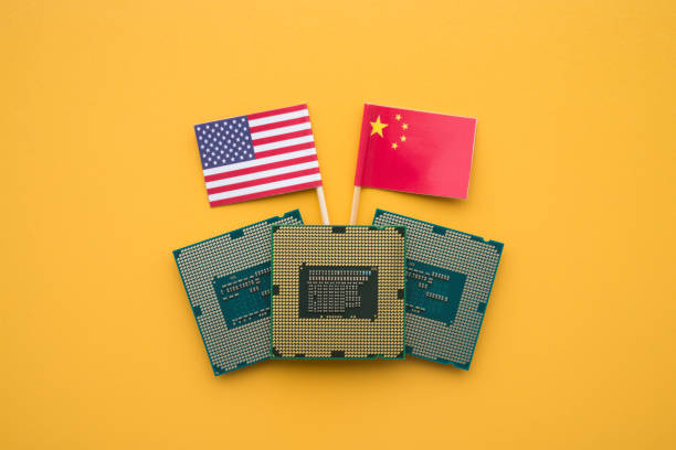 istock CPU computer (central processing unit) with US and Chinese flag on yellow background. 2170149188