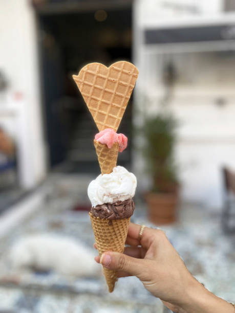 istock young woman hand holding ice cream 2170149419
