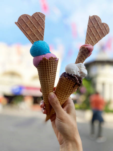 istock young woman hand holding ice cream 2170149471