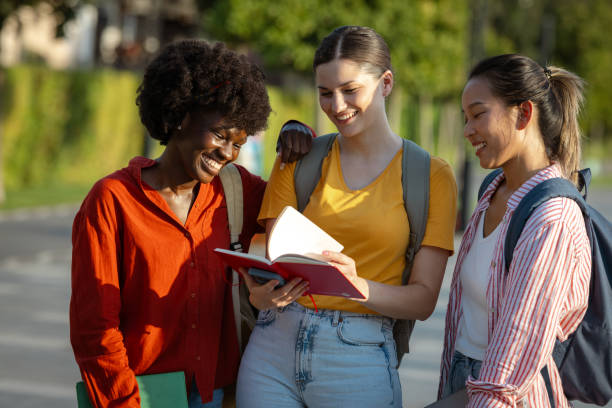 istock Multi-ethnic group of female students discuss the school project 2170149554