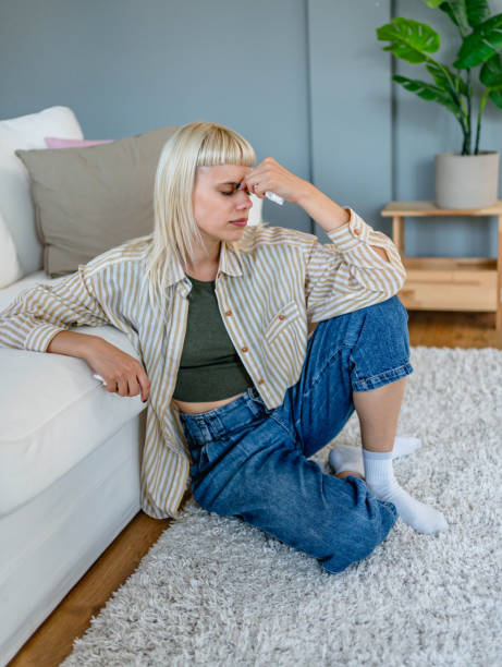 istock Sad woman crying at home 2170149578