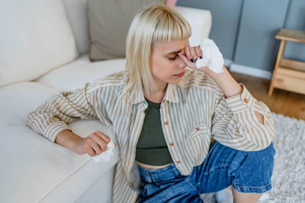 istock Sad woman crying at home 2170149893