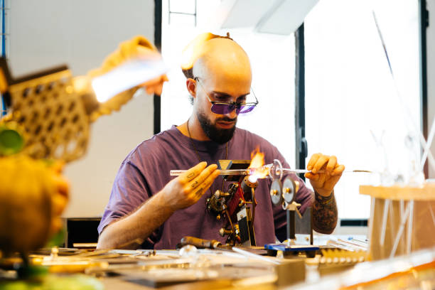 istock A Skilled Glassblower Expertly Creates Elegant Crystal Glass in a Modern and Innovative Studio 2170149917