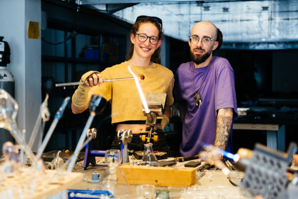 istock Two Glassblowers Posing in a Studio During a Glassblowing Demonstration 2170150165