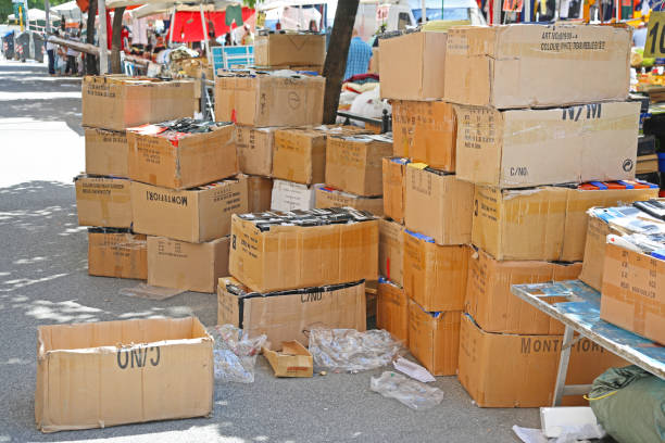 Rome, Italy - June 29, 2014: Large Stack of Cardboard Boxes at Porta Portese Street Flea Market in Capital City Summer.