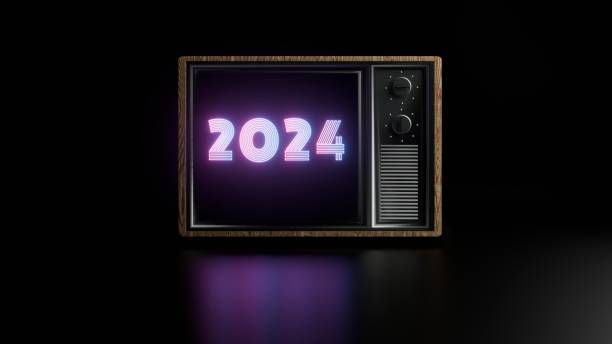 istock Retro Television Displaying Neon 2024 Text in a Dark Background 2170153550
