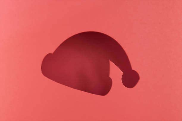 Layered Red Christmas Background with Santa Hat. Digitally generated image. 3d render.