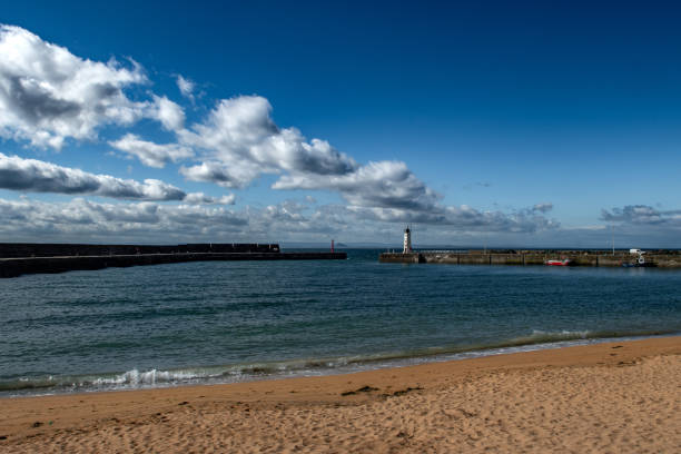 istock Harbor With Chalmers Lighthouse And Sandy Beach In Anstruther At The Atlantic Coast Of Scotland, UK 2170157062