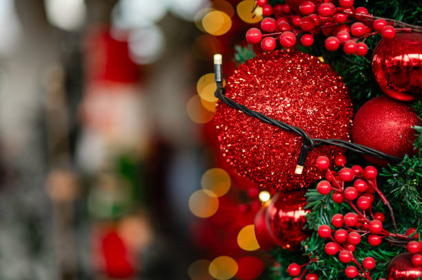istock a christmas tree with red balls and berries 2170158380