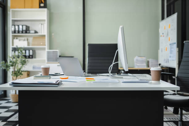 istock Workspace with desktop computer, office supplies, houseplant and coffee cup at office. desk work concept. 2170168080