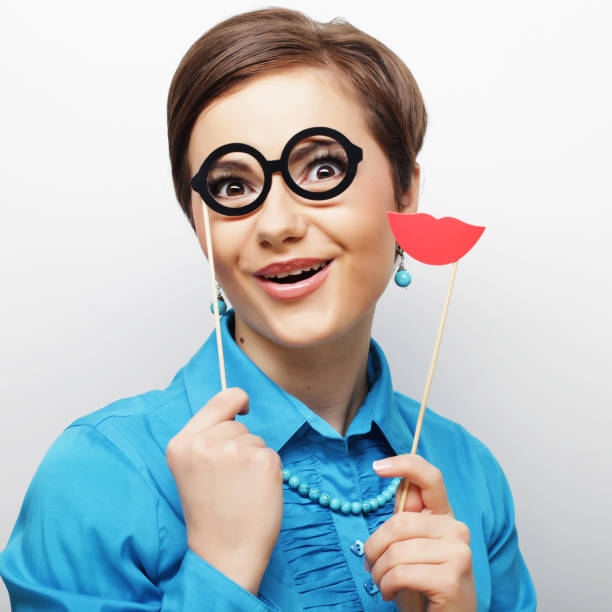 istock playful young woman ready for party 2170169793