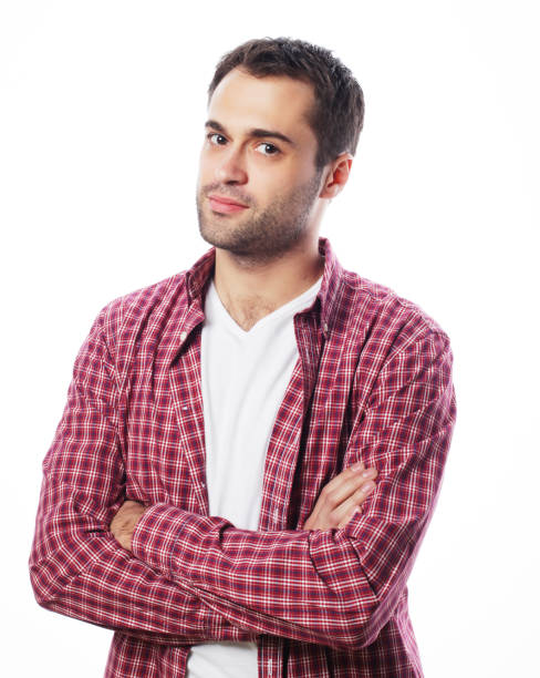 istock Handsome young man in shirt looking at camera 2170169819