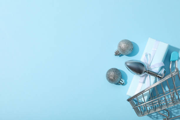 istock Metal butt plug with gifts on a blue background. 2170171772