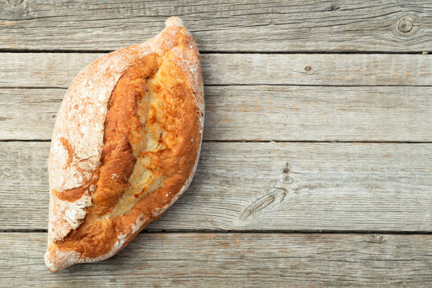istock Loaf of  wheat hearth bread . Top view 2170175657