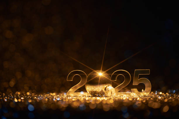 istock Golden New Year 2025 Celebration Display with Sparkling Decorations and Defocused Glittering Lights 2170180752
