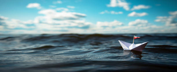istock XXL Paper boat panorama in big waves 2170182464