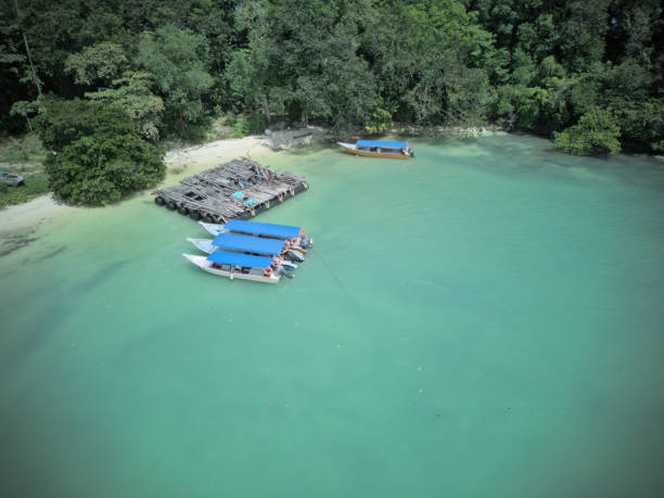 istock Tropical beach with parked boats 2170182474