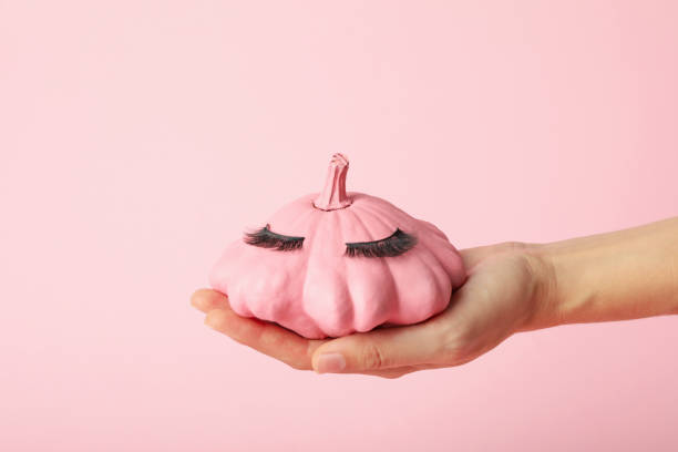 istock Pumpkin with eyelashes. Skin and face care concept. 2170189133