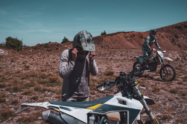 istock Motocross riders taking a break from riding 2170194248