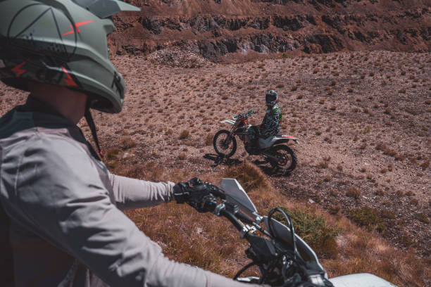 istock Motocross riders taking a break from riding 2170194259