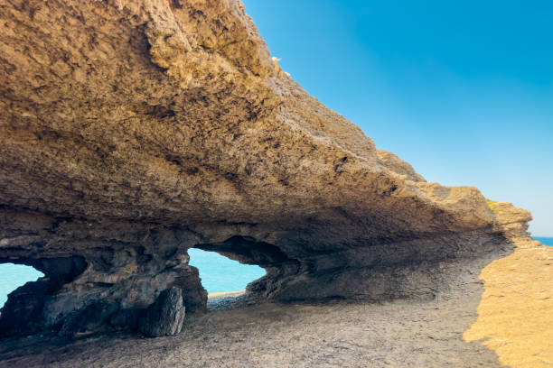 istock La Ojerada is a Natural arch in Cantabrian coastline, Spain. 2170194568