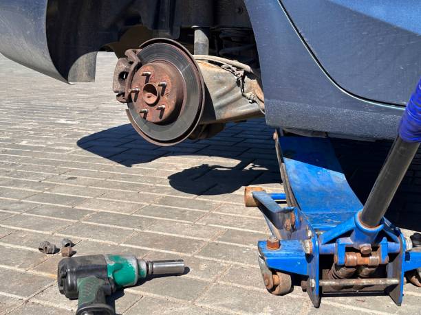 istock Tire Wheel Replacement at Car Repair Service. 2170196044