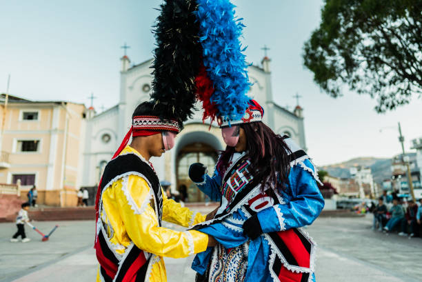 istock Shacsha dancer helping  friend on Huaraz, in Peru 2170196946