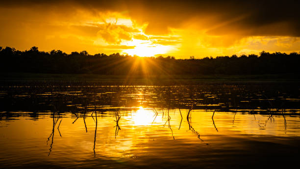 istock Evening sun rays with rain clouds forming over Thap Salao Dam, Uthai Thani Province, Thailand. 2170197110