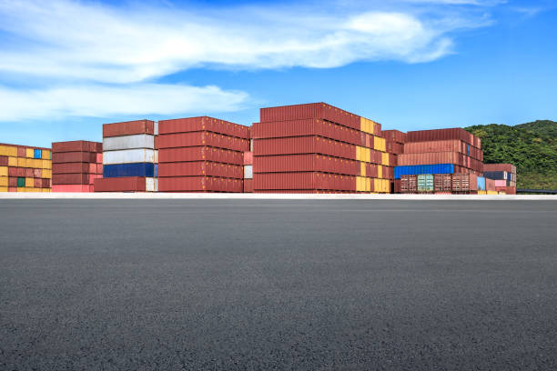 Empty road and stacked containers at port, China