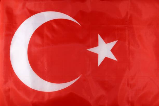 istock Turkish flag featuring a crescent moon and star, vibrant red background, symbolizing national identity and culture 2170201256