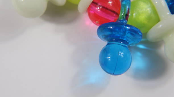 istock Focus on first floor toy colorful plastic pacifiers 2170205194