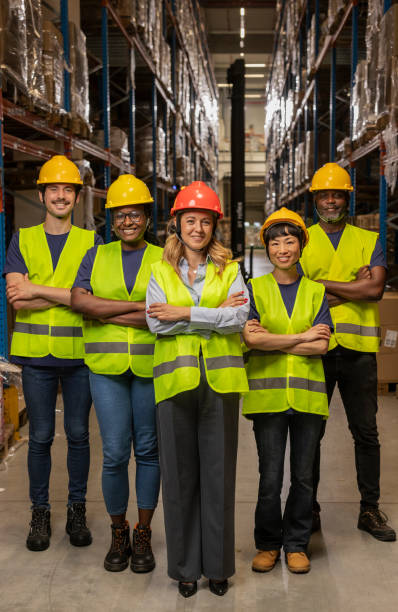 istock Diverse Warehouse Team Wearing Safety Gear in Industrial Setting 2170206386