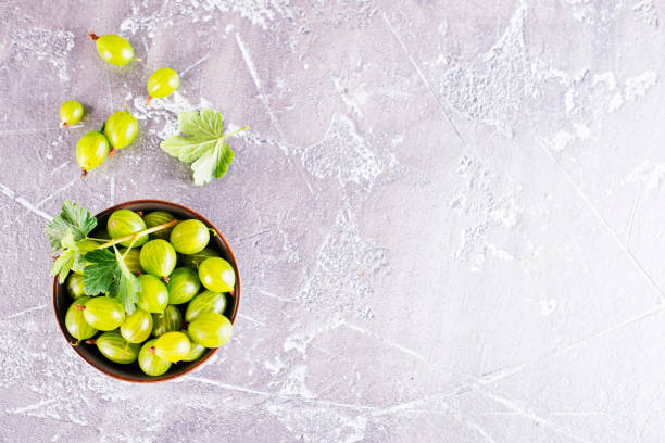 istock fresh organic gooseberries in a wooden bowl 2170209716