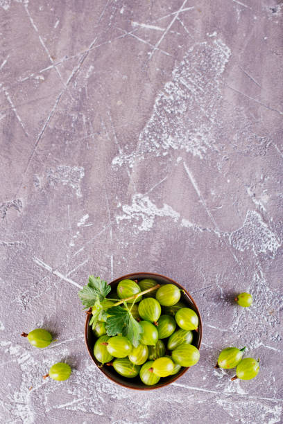 istock fresh organic gooseberries in a wooden bowl 2170209723