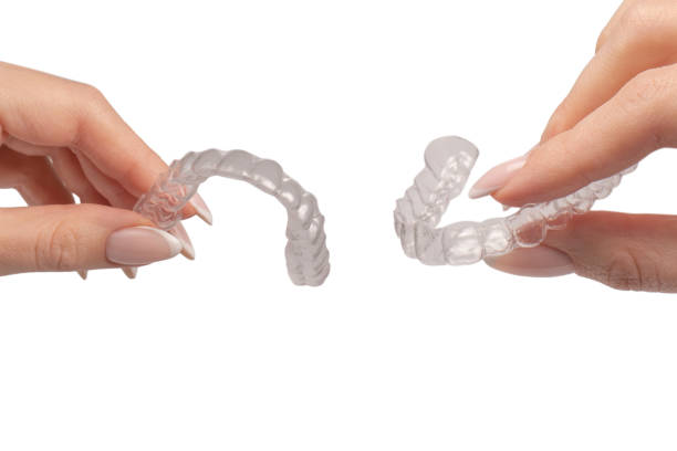 istock Transparent mouth guard in a woman's hand isolated. 2170210959