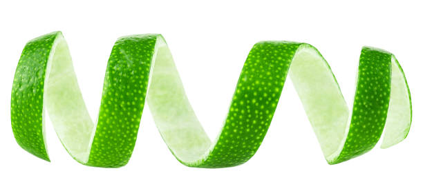 istock Fresh lime zest slice isolated on a white background. Curly lime peel. 2170213645