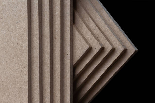 MDF board with black background, Medium Density Fiberboard (MDF) MDF board with black background, Medium Density Fiberboard (MDF), MDF board is a material that has good thermal and moisture resistance mdf planks texture stock pictures, royalty-free photos & images