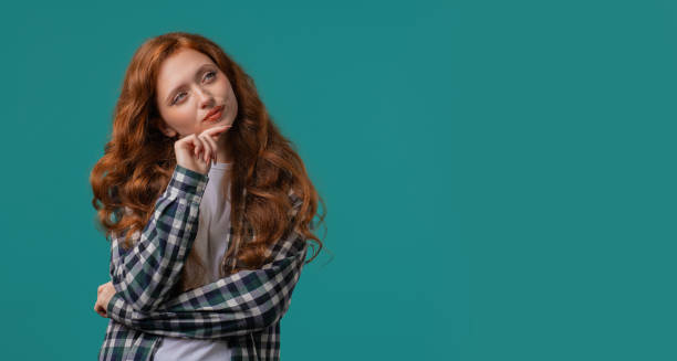 istock Portrait of curious analyzing woman in blue studio.Mindful girl finding solution 2170214594