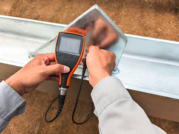 istock Measure the Coating Thickness Galvanized with a Coating Thickness Gauge by Specification of Project for Steel Structure Work at Industrial Factories. 2170217434