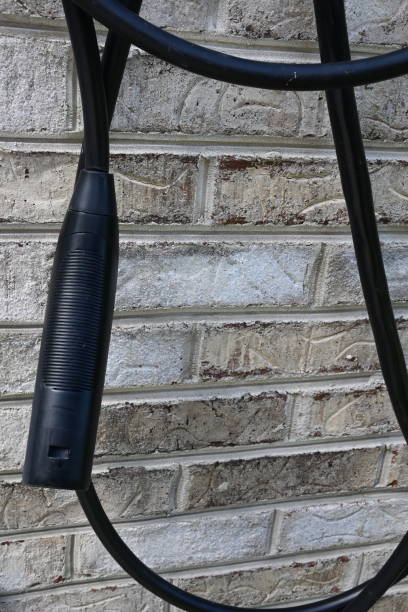 istock Home EV Charger Mounted Outside Against Brick Wall 2170219235