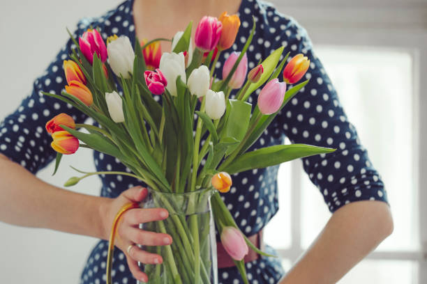 Woman holding tulips