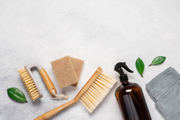istock Cleaning supplies on a light background with copy space 2170221006