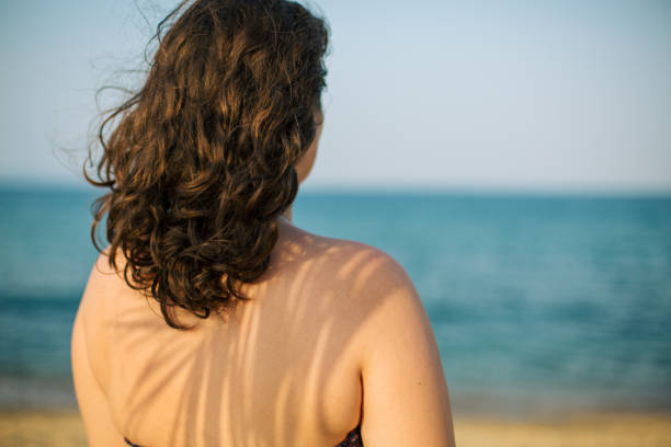 istock Woman enjoying the sea 2170224976