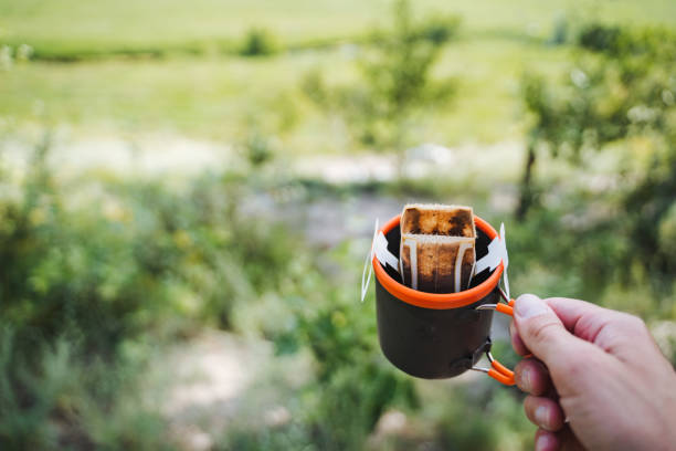 istock Transform your outdoor coffee routine with a convenient portable drip coffee maker amidst the beauty of nature, adding a touch of luxury to your wilderness relaxation 2170226814