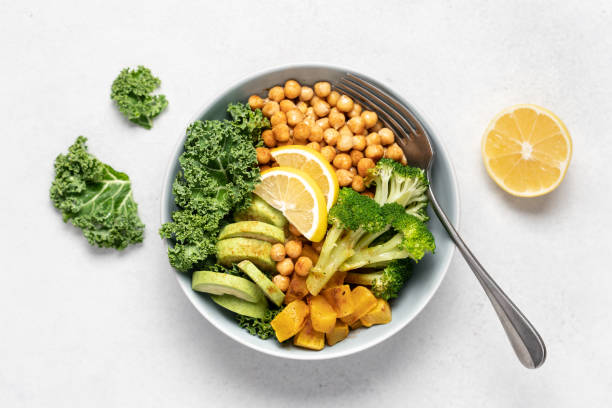istock Buddha bowl salad with chickpeas, avocado, kale, broccoli and pumpkin 2170231848